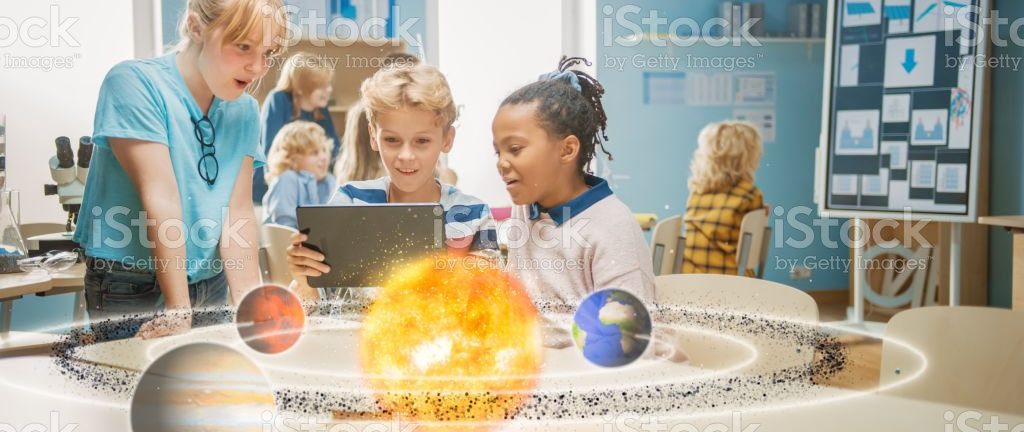Three Diverse School Children in Science Class Use Digital Tablet Computer with AR Software, Looking at Educational 3D Animation Of Solar System. VFX, Special Effects Render