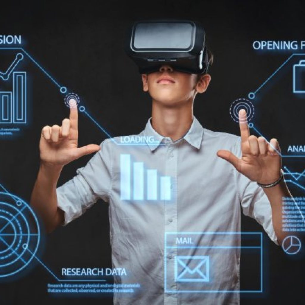 images of Latest Trending Technologies in Extended Reality. source from : http://<a href="https://www.freepik.com/free-photo/teenager-dressed-white-t-shirt-using-virtual-reality-glasses-with-graph-charts-numbers-lines-technology-concept_25129877.htm#from_view=detail_alsolike">Image by fxquadro</a> on Freepik